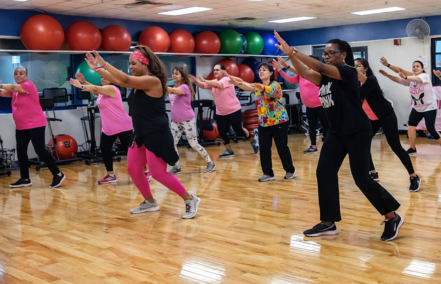 A group of people dancing and exercising